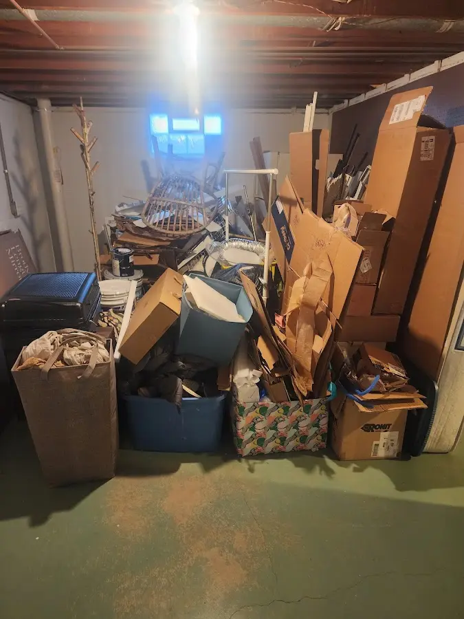 Roll-off dumpster container at job site for 2 Yard Dumpster Rental in Attica